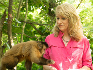 Kelly Lambert feeding monkey